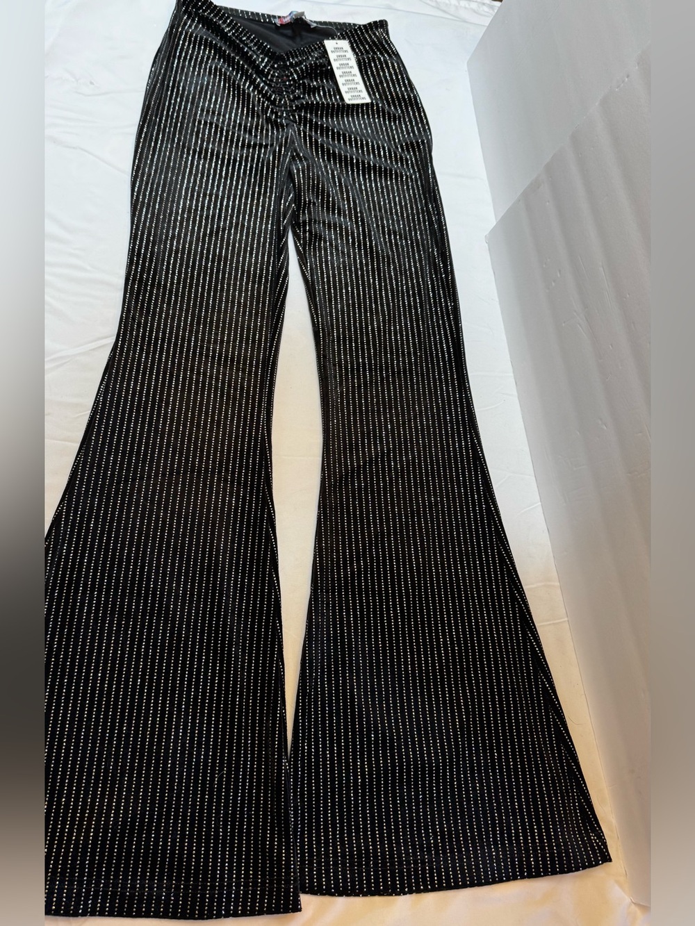 Urban Outfitters Black v front pull on flare leg with rhinestone like stripes